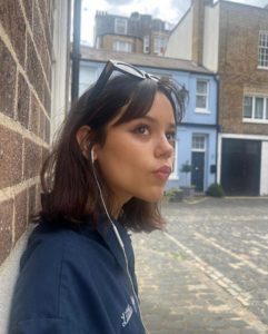 jenna ortega wired earphones